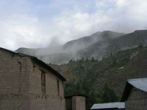 Dust filled the entire valley over the next 15 minutes after the earthquake. You can see the crack in the adobe building to the left. several building throughout the valley were leveled. Fortunately, our hostel was not one of them. 